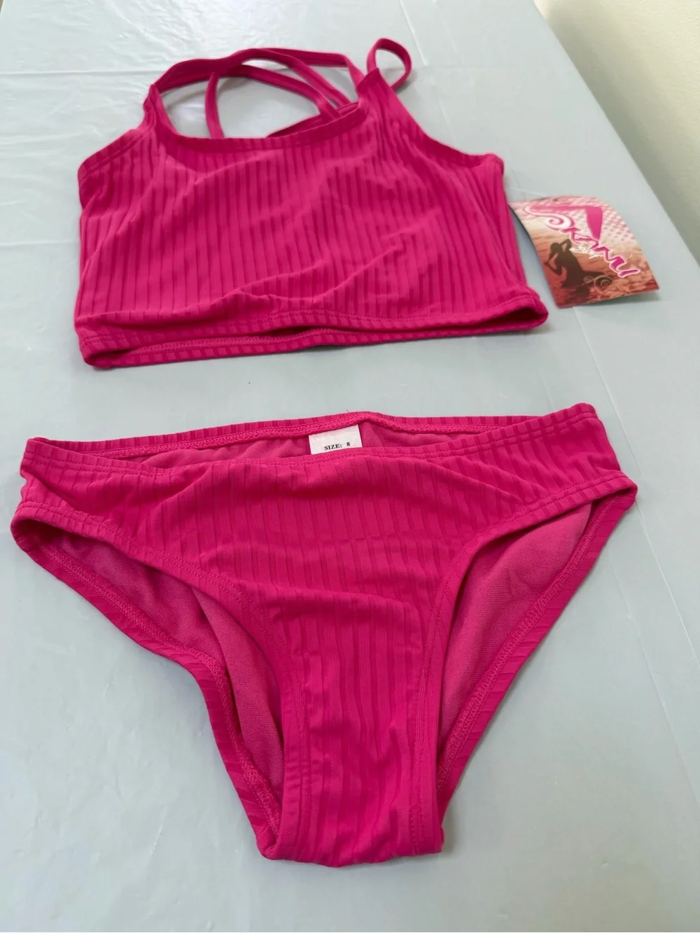 Kanu Surf Girls' UPF 50+ Beach Sport Criss-Cross Tankini, Solid Pink 8